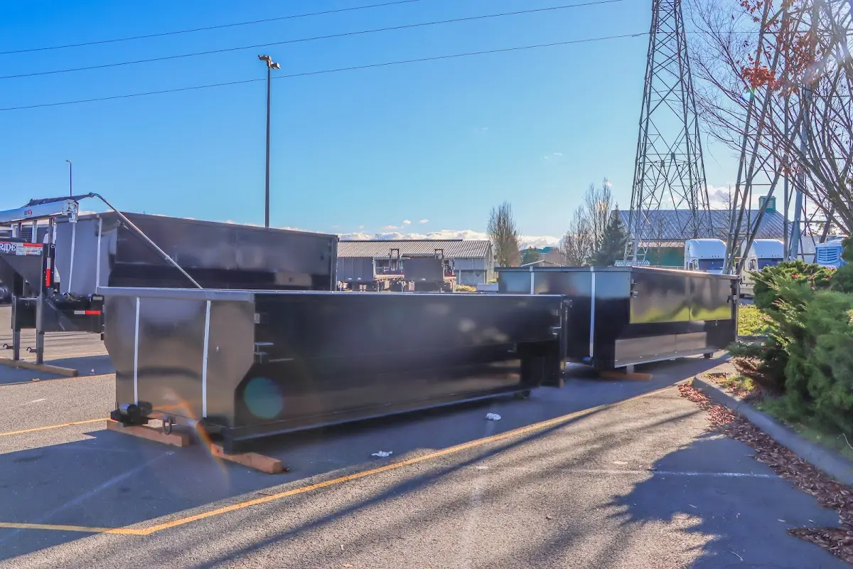 Roll-off dumpster ready for waste disposal at job site for 15 Yard Dumpster Rental in DeKalb
